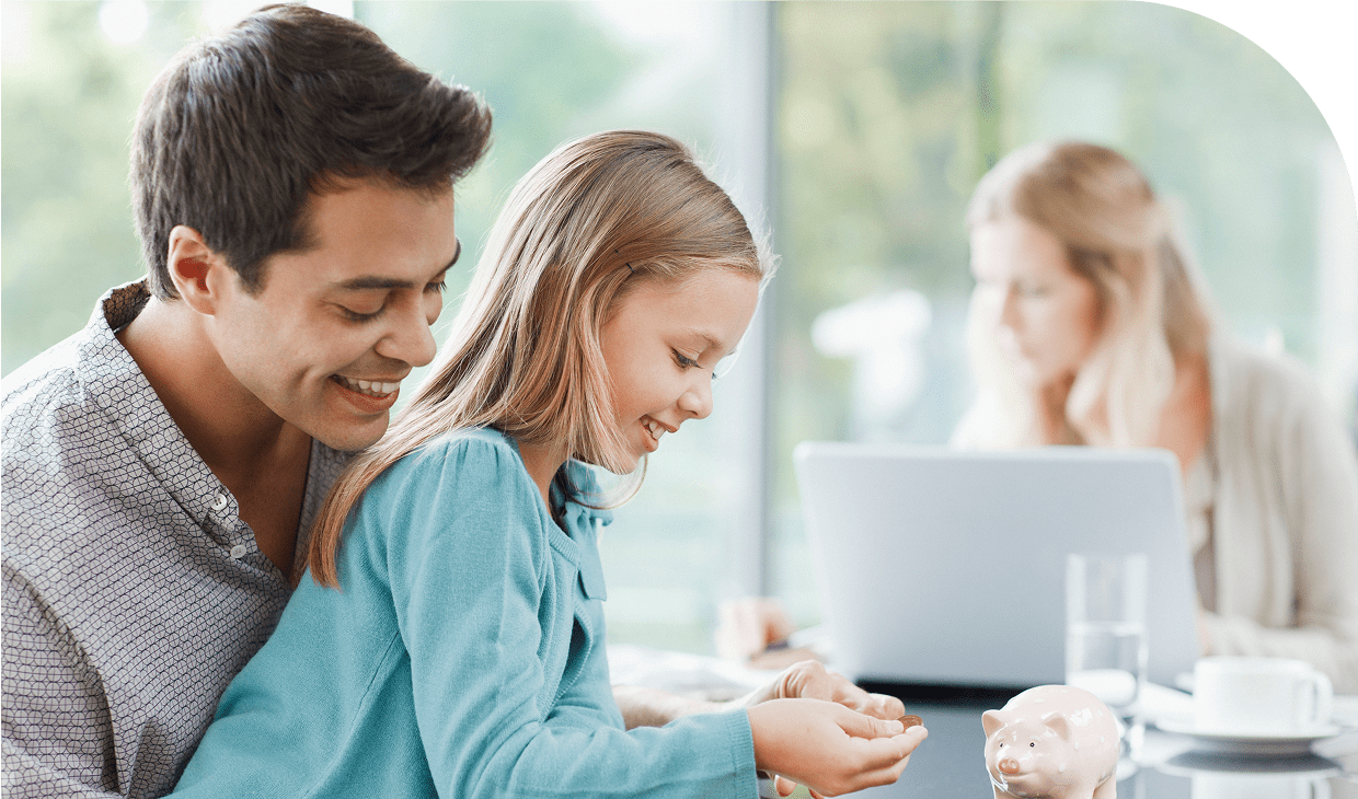 Father and daughter saving money together