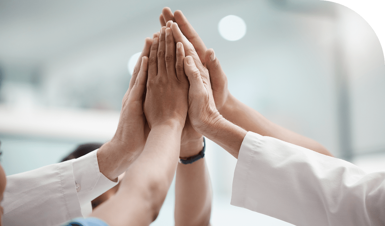 Team members giving a high-five