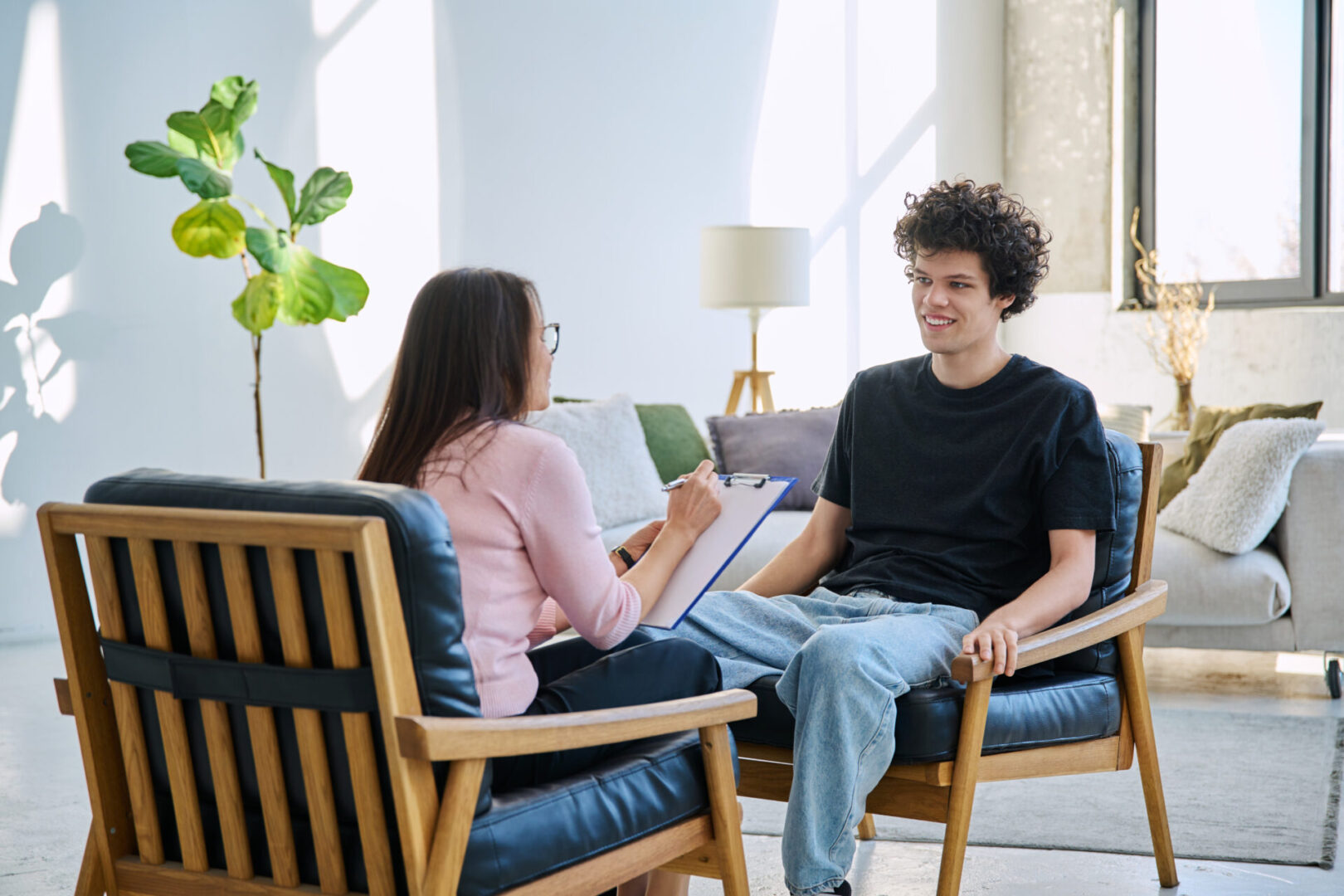 Counseling session with a therapist and client