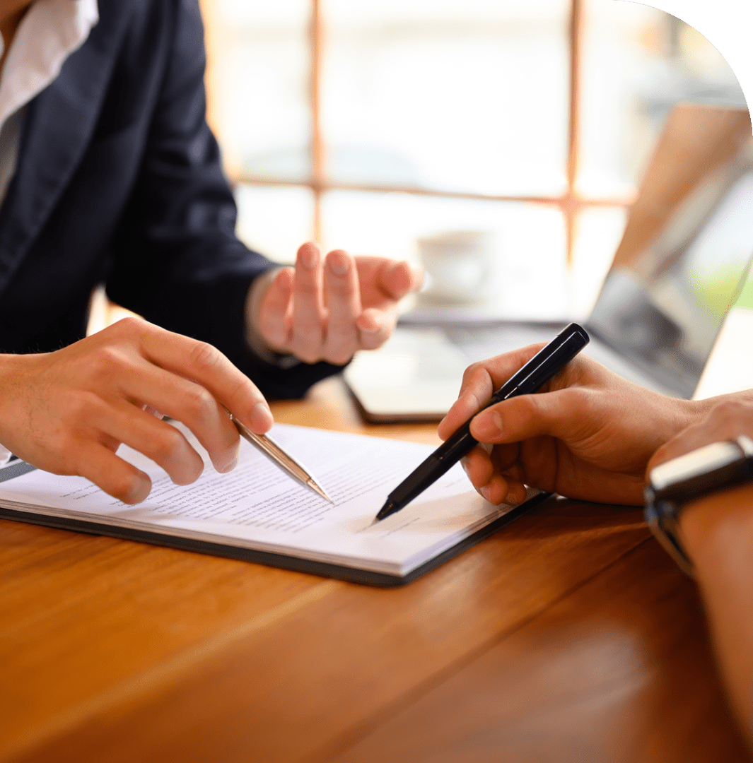 Two people discussing contract details