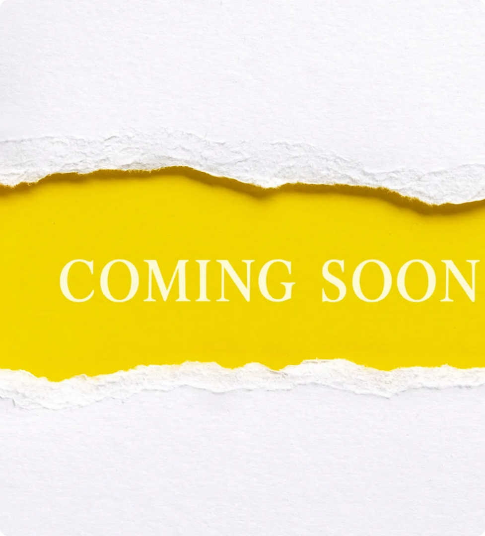Torn paper revealing "Coming Soon" text